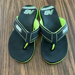 Kids New Balance flip flops, never worn (except to try on). Size M (2.5)